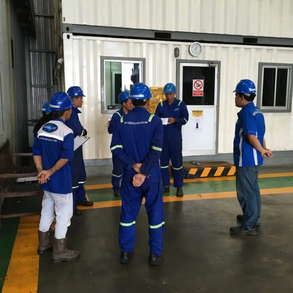SCI Indonesia technicians performing professional cleaning and paint removal on a mining site using Sodablast Systems technology.